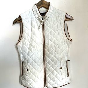 White puffer vest.